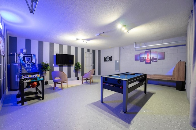2792 Roccella Ct, Kissimmee, FL 34747 - game room with wallpapered walls, concrete block wall, billiards table, a textured ceiling, and electric panel