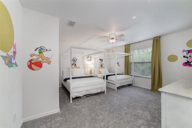2792 Roccella Ct, Kissimmee, FL 34747 - carpeted bedroom with baseboards and a ceiling fan