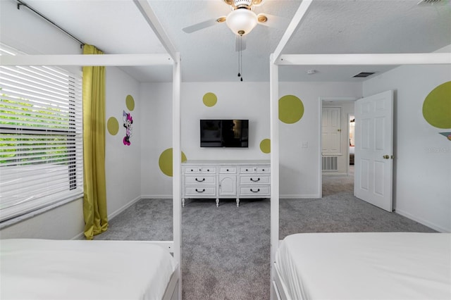 2792 Roccella Ct, Kissimmee, FL 34747 - carpeted bedroom with ceiling fan and baseboards