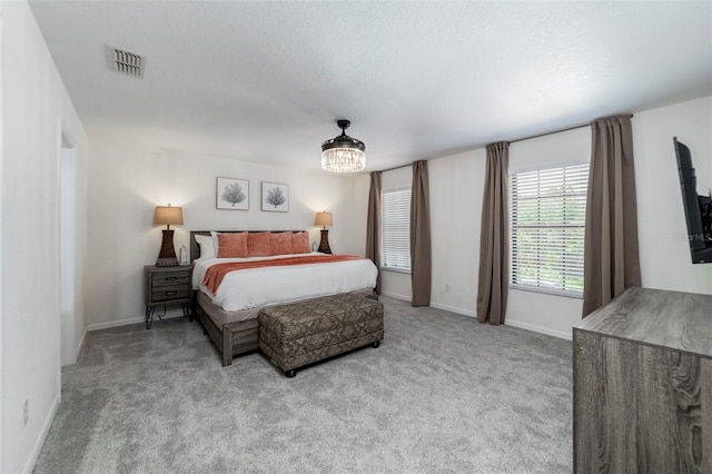 2792 Roccella Ct, Kissimmee, FL 34747 - bedroom featuring carpet floors and a textured ceiling