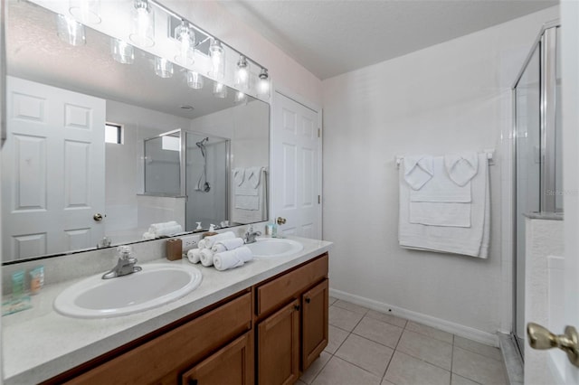 2792 Roccella Ct, Kissimmee, FL 34747 - full bath featuring a shower stall, double vanity, and tile patterned flooring