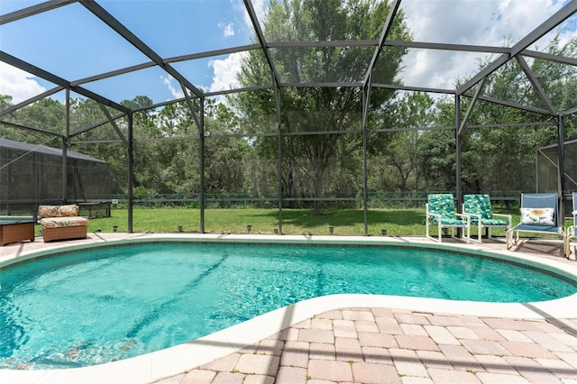2792 Roccella Ct, Kissimmee, FL 34747 - outdoor pool with a patio area, a yard, and a lanai