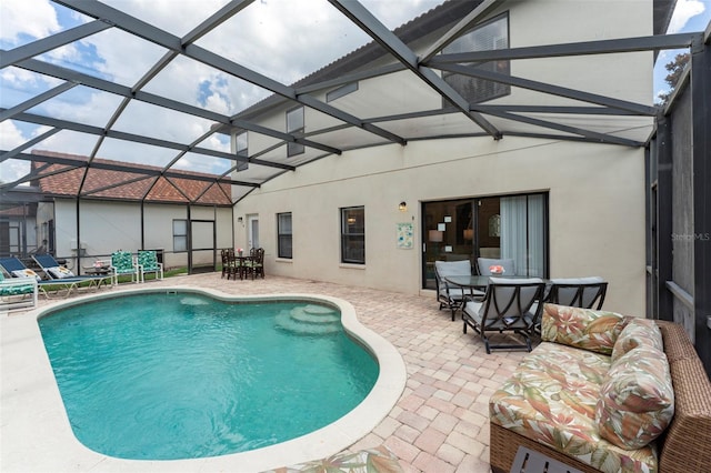 2792 Roccella Ct, Kissimmee, FL 34747 - outdoor pool featuring outdoor dining space, a patio area, and a lanai