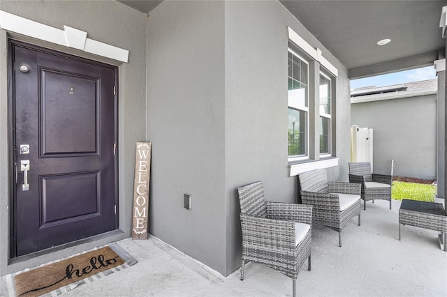4491 Holstein St, Saint Cloud, FL 34772 - entrance to property with stucco siding and a porch