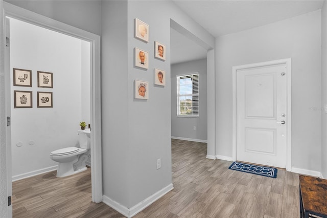 4491 Holstein St, Saint Cloud, FL 34772 - entryway featuring wood finished floors and baseboards