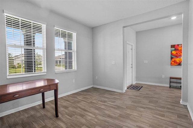 4491 Holstein St, Saint Cloud, FL 34772 - unfurnished office with wood finished floors and baseboards