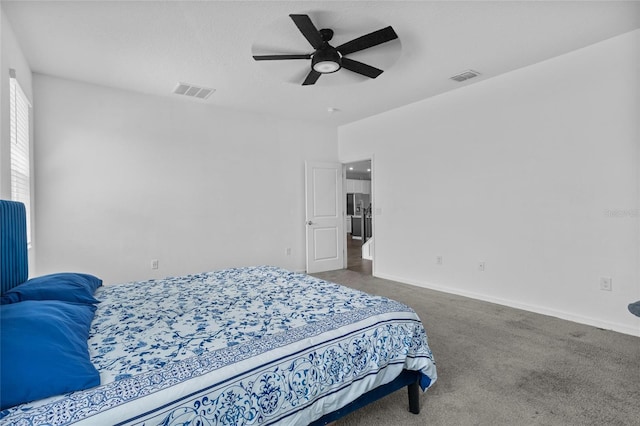 4491 Holstein St, Saint Cloud, FL 34772 - carpeted bedroom featuring baseboards and a ceiling fan