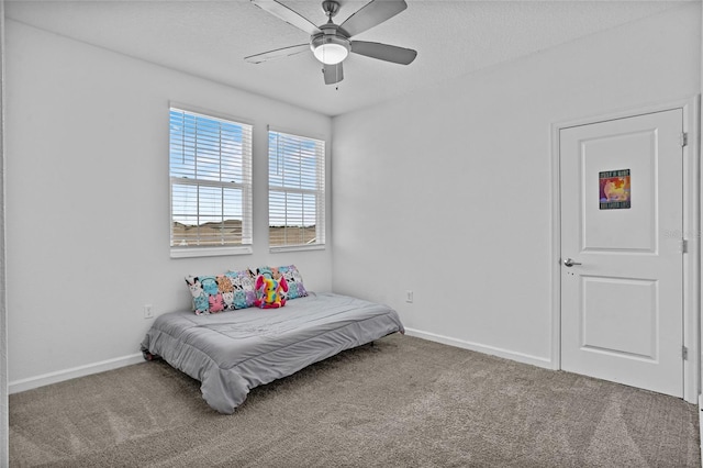 4491 Holstein St, Saint Cloud, FL 34772 - carpeted bedroom with baseboards and ceiling fan