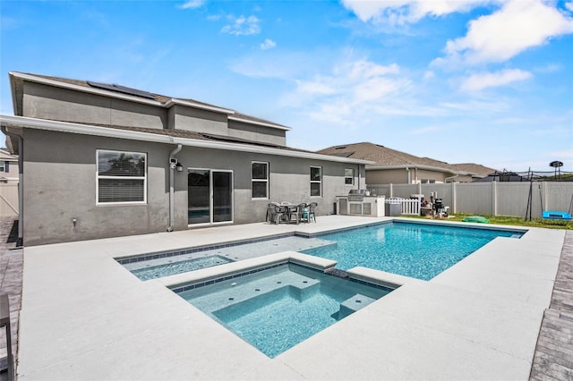 4491 Holstein St, Saint Cloud, FL 34772 - view of pool with a patio, a pool with connected hot tub, and a fenced backyard