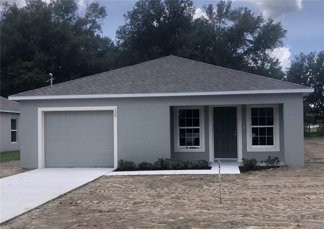 120 Highland Ave, Auburndale, FL 33823 - ranch-style house featuring roof with shingles, stucco siding, an attached garage, and driveway