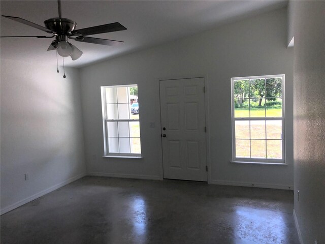 120 Highland Ave, Auburndale, FL 33823 - foyer entrance with lofted ceiling, finished concrete flooring, and ceiling fan