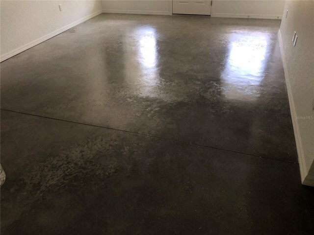 120 Highland Ave, Auburndale, FL 33823 - empty room featuring finished concrete floors