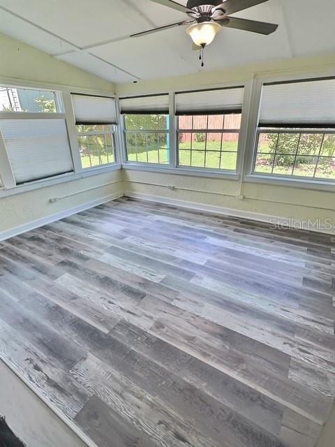 520 Jupiter Blvd NW, Palm Bay, FL 32907 - unfurnished sunroom featuring lofted ceiling