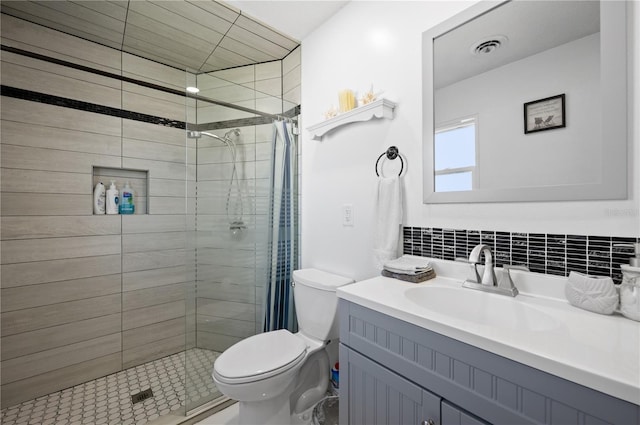874 Acadia Rd, Venice, FL 34293 - bathroom with vanity, a shower stall, and backsplash