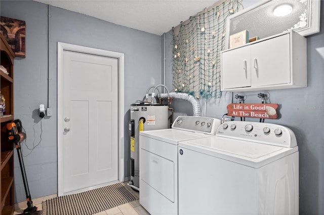 874 Acadia Rd, Venice, FL 34293 - laundry area with cabinet space, electric water heater, washer and clothes dryer, and light tile patterned floors