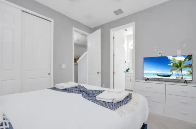1870 Sawyer Palm Pl Unit 1870, Kissimmee, FL 34747 - bedroom featuring a closet and ensuite bathroom