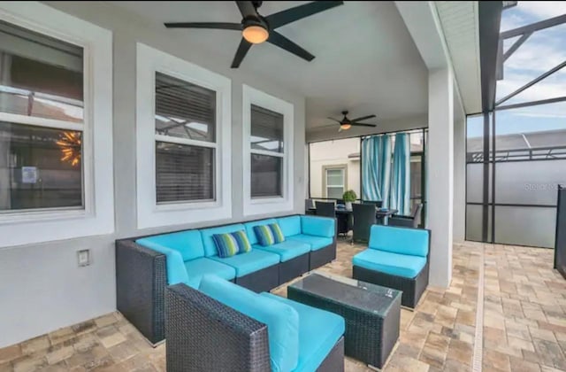 1870 Sawyer Palm Pl Unit 1870, Kissimmee, FL 34747 - view of patio featuring ceiling fan, an outdoor living space, and glass enclosure