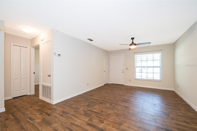 2531 Coral Ave, Kissimmee, FL 34741 - empty room with dark wood-style flooring and ceiling fan