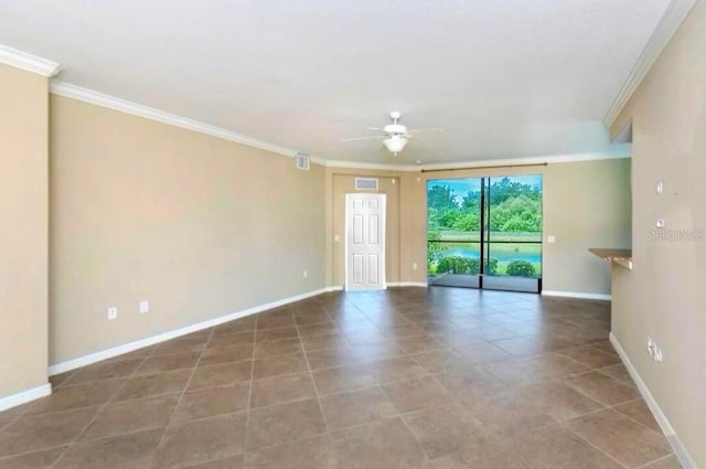 20080 Ragazza Cir Unit 102, Venice, FL 34293 - tiled spare room featuring a ceiling fan and crown molding