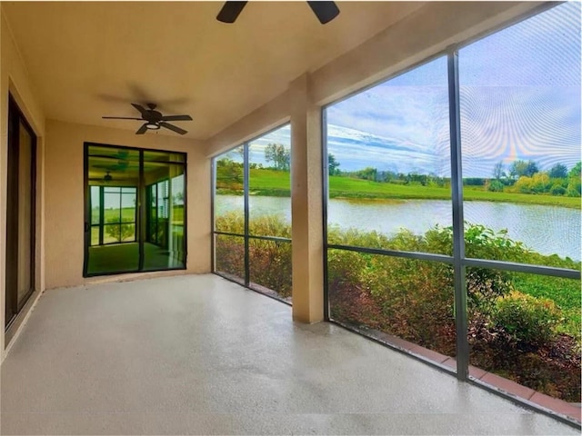 20080 Ragazza Cir Unit 102, Venice, FL 34293 - unfurnished sunroom featuring a water view