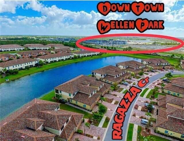 20080 Ragazza Cir Unit 102, Venice, FL 34293 - aerial perspective of suburban area featuring a nearby body of water