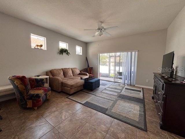 14548 Black Cherry Trl, Winter Garden, FL 34787 - living area with a ceiling fan and a textured ceiling