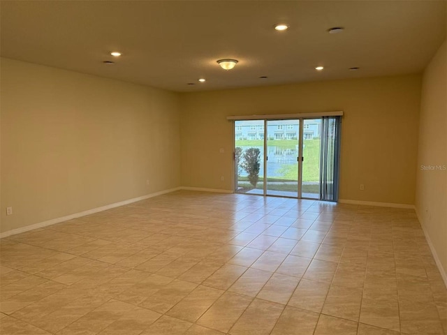2602 Buena View Rd, Kissimmee, FL 34746 - unfurnished room with recessed lighting, light tile patterned floors, and a smoke detector