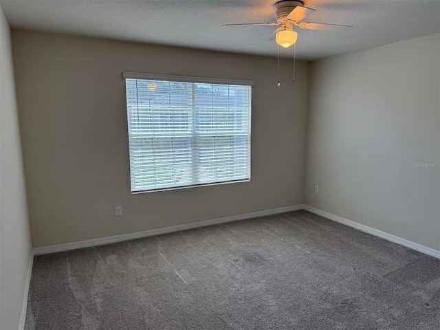 2602 Buena View Rd, Kissimmee, FL 34746 - unfurnished room featuring carpet flooring, a ceiling fan, and a textured ceiling