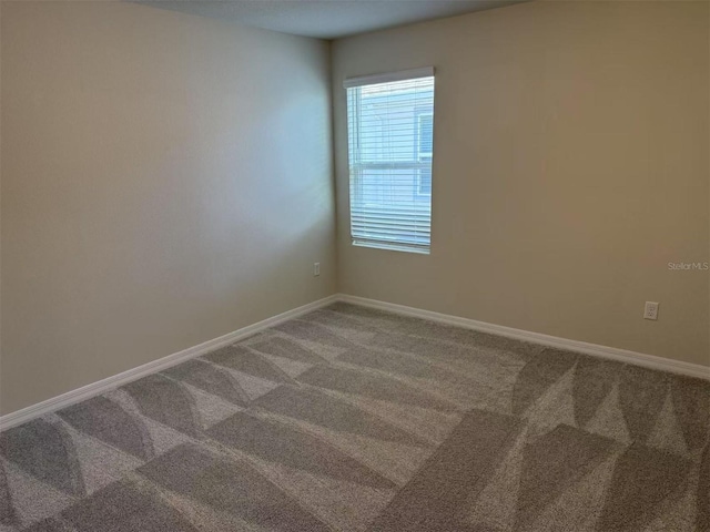 2602 Buena View Rd, Kissimmee, FL 34746 - spare room featuring carpet flooring