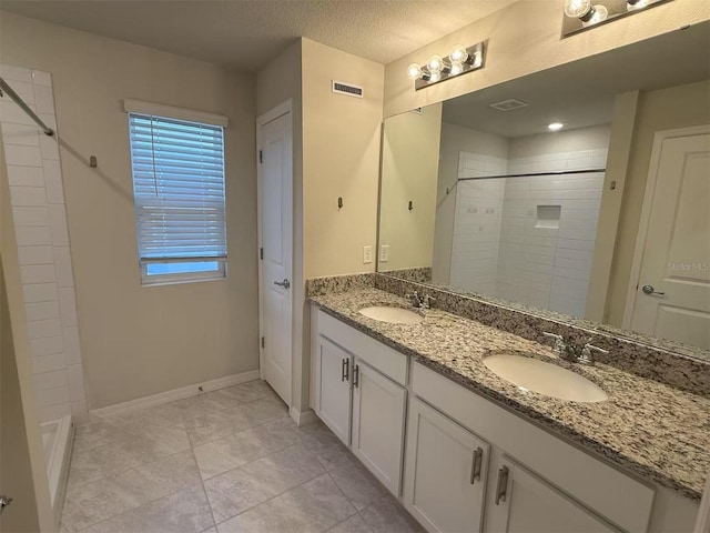 2602 Buena View Rd, Kissimmee, FL 34746 - bathroom with double vanity and tiled shower / bath combo