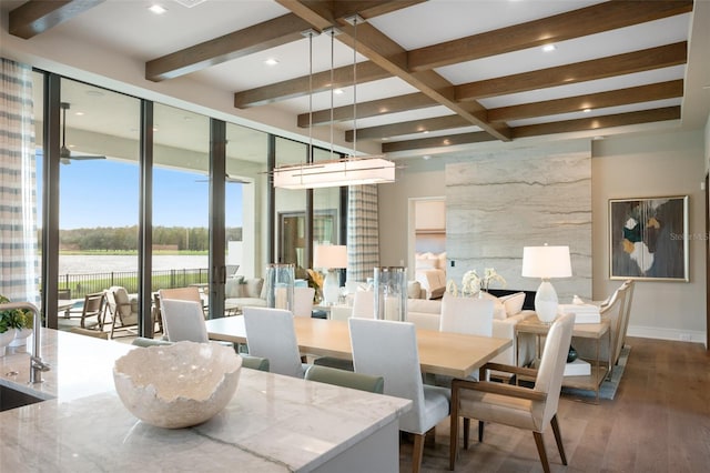 4162 Grande Brick Loop Unit 27, Orlando, FL 32837 - dining room featuring beamed ceiling, wood finished floors, and recessed lighting