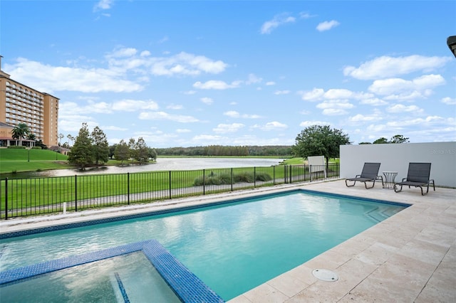 4162 Grande Brick Loop Unit 27, Orlando, FL 32837 - view of swimming pool with a pool with connected hot tub, a patio, and a water view