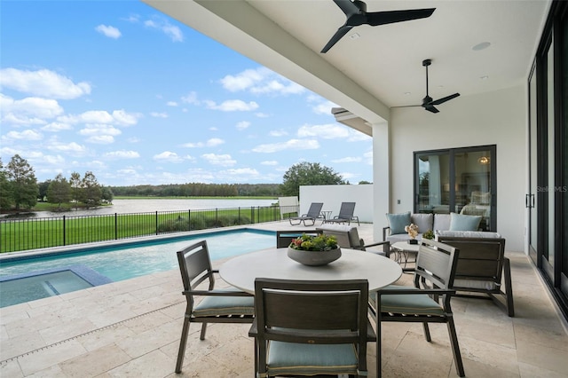 4162 Grande Brick Loop Unit 27, Orlando, FL 32837 - view of swimming pool with a ceiling fan, a patio, a water view, a pool with connected hot tub, and outdoor dining area