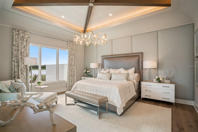 4162 Grande Brick Loop Unit 27, Orlando, FL 32837 - bedroom featuring a raised ceiling, wood finished floors, a chandelier, and recessed lighting