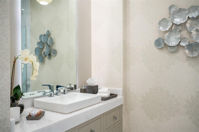 4162 Grande Brick Loop Unit 27, Orlando, FL 32837 - bathroom with vanity and wallpapered walls