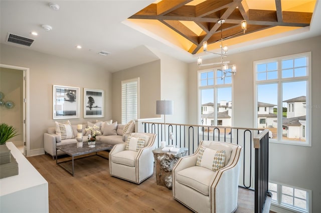 4162 Grande Brick Loop Unit 27, Orlando, FL 32837 - living room with a chandelier, light wood-style floors, and recessed lighting