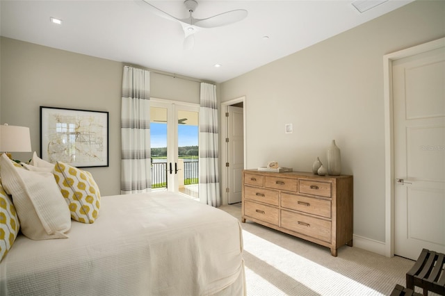 4162 Grande Brick Loop Unit 27, Orlando, FL 32837 - bedroom featuring light colored carpet, access to exterior, and a ceiling fan