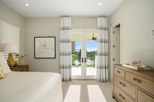 4162 Grande Brick Loop Unit 27, Orlando, FL 32837 - bedroom featuring access to outside, light colored carpet, and french doors