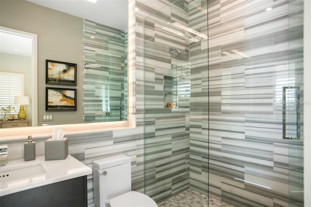 4162 Grande Brick Loop Unit 27, Orlando, FL 32837 - full bathroom with a shower stall, vanity, and tile walls
