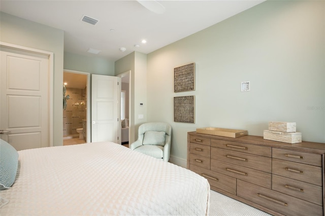 4162 Grande Brick Loop Unit 27, Orlando, FL 32837 - bedroom featuring connected bathroom and baseboards