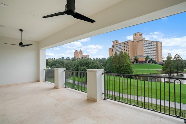 4162 Grande Brick Loop Unit 27, Orlando, FL 32837 - patio / terrace featuring ceiling fan, a yard, and a water view