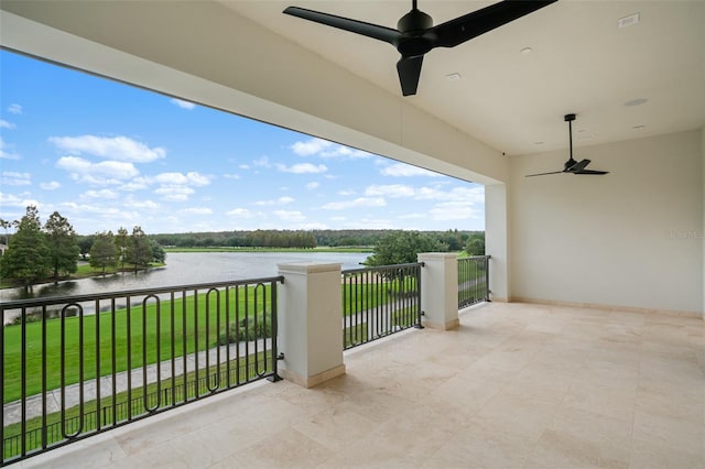 4162 Grande Brick Loop Unit 27, Orlando, FL 32837 - patio / terrace with a water view, a ceiling fan, and a yard