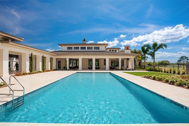 4162 Grande Brick Loop Unit 27, Orlando, FL 32837 - community pool with a patio
