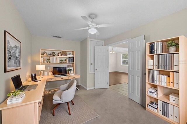 2534 Double Tree Pl, Oviedo, FL 32766 - office space featuring ceiling fan, light carpet, and a chandelier