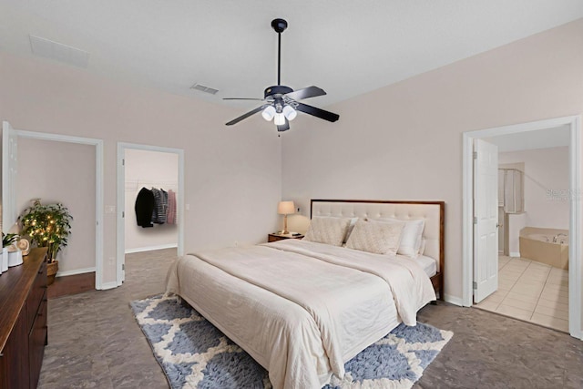 2534 Double Tree Pl, Oviedo, FL 32766 - bedroom with ceiling fan and connected bathroom