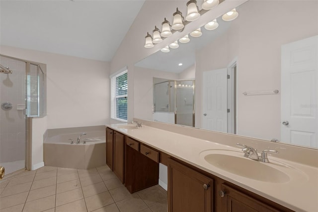 2534 Double Tree Pl, Oviedo, FL 32766 - bathroom with a stall shower, lofted ceiling, double vanity, a bath, and tile patterned flooring