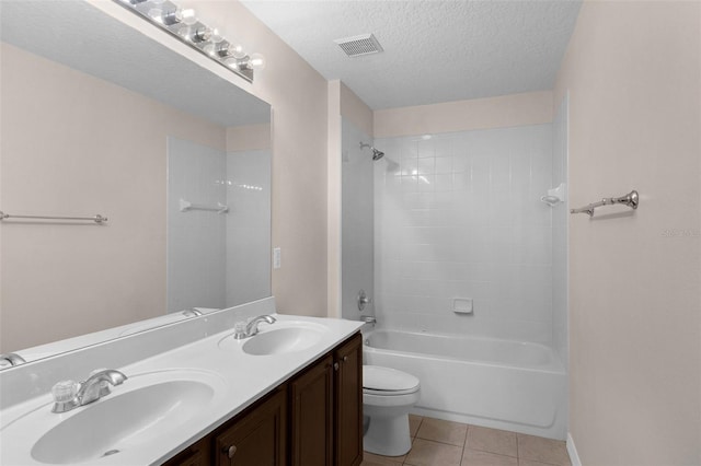 2534 Double Tree Pl, Oviedo, FL 32766 - full bathroom featuring double vanity, tile patterned flooring, shower / bathtub combination, and a textured ceiling