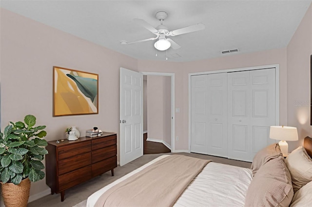 2534 Double Tree Pl, Oviedo, FL 32766 - bedroom with light carpet, a closet, and ceiling fan