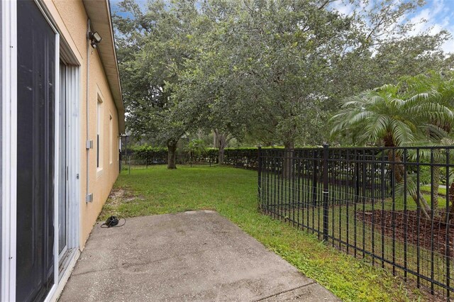 2534 Double Tree Pl, Oviedo, FL 32766 - fenced backyard with a patio area