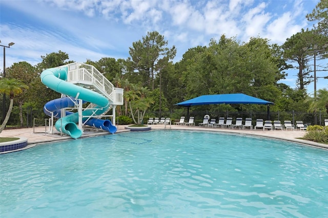 2534 Double Tree Pl, Oviedo, FL 32766 - community pool featuring a water slide and a patio area